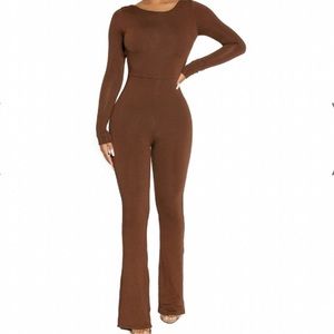 Naked Wardrobe I PLAY FLARE JUMPSUIT